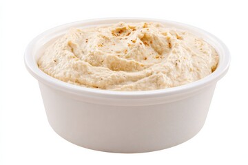 Creamy hummus in a white bowl, ready to be enjoyed.