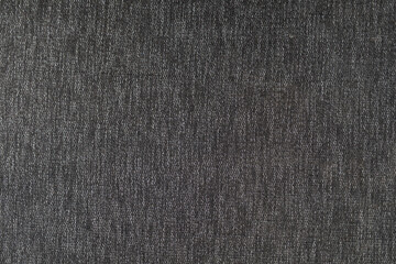 High-resolution image of dark gray textured fabric. Perfect for backgrounds or textile designs.