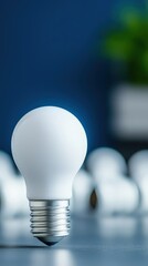 Classic light bulb illuminating a tabletop creating warmth and ambiance in a cozy setting