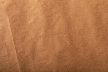 High-resolution image of brown paper texture, perfect for backgrounds and designs.