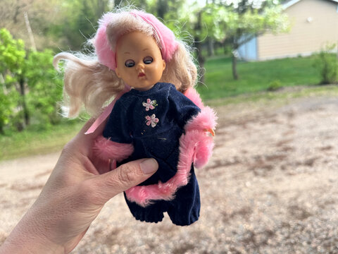 Scandia, MInnesota - May 9, 2025: Hand holds an authentic original Ginny Dolls Skating Fun Doll Vogue Dolls 1986