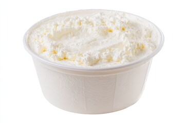 Close-up of a bowl of creamy, white dairy product.