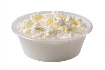Creamy, fluffy cottage cheese in a clear plastic bowl.