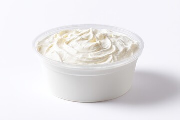 Creamy white dip in a plastic cup.