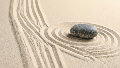 Obraz premium Creating tranquility stone in sand zen garden natural art serene environment close-up view mindfulness concept