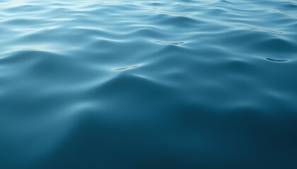 Serene waves on a tranquil blue ocean surface.