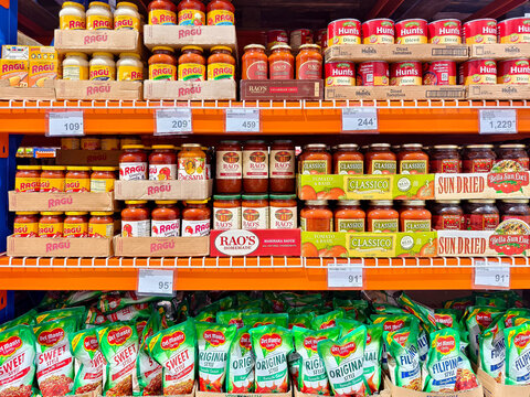 Philippines - May 11, 2025: Multiple pasta sauce brands such as Ragu, Rao&rsquo;s, Prego, Classico, and Del Monte on grocery shelf with various flavor styles.