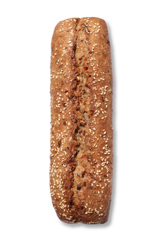 A loaf of healthy bread with sesame seeds isolated on a white background, top view