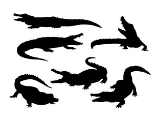 set of crocodile silhouettes various poses