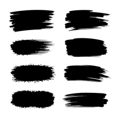A collection of modern grungy paint brush strokes is presented, featuring calligraphy with straight smears, stamp, and lines, all hand drawn in ink and isolated on a white background with modern