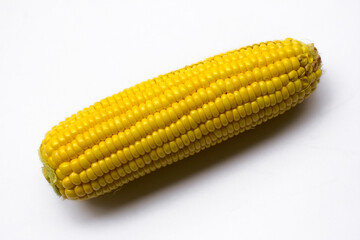 A fresh sweet corn isolated on white background.