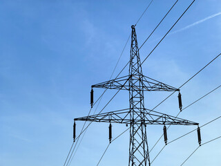 high voltage post.High-voltage tower with clear sky background