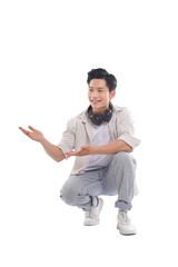 Asian student sitting posing on white background