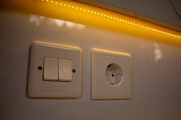 Indonesia, May 14 2025, Consider the strategic placement of Indonesian power outlets or sockets within a minimalist TV backdrop design for seamless functionality and a clean aesthetic.