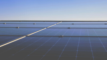 Close-Up of Solar Panel Glass with Blue Sky Background