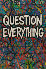Question everything — a bold graffiti message painted on a colorful brick wall, inspiring critical thinking