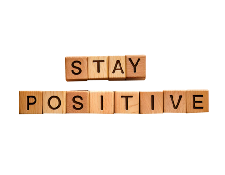 Stay positive text on wooden cubes; motivation and inspiration concept on transparent background and white background 