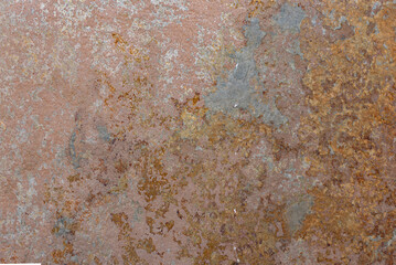 Facade with red phyllite stone cladding, natural and rustic texture