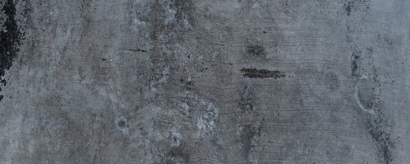 Close-up of a floor surface with aged mold and concrete texture