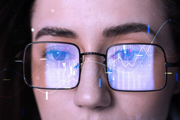 Stock exchange. Trader analyzing data, closeup. Graphs reflecting in her eyeglasses