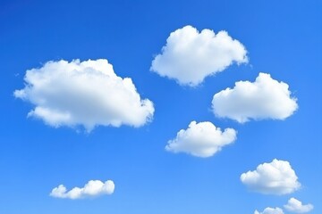 Fluffy white cumulus clouds scattered across a vibrant cerulean blue sky