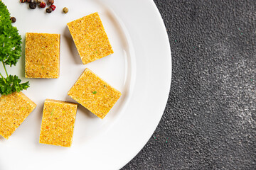 Broth cube vegetable, meat broth concentrated broth chicken, pork, beef meat natural food fresh dish on the table rustic food top view copy space