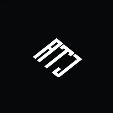 ATJ letter logo design on black background.