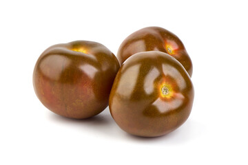 Fresh ripe kumatoes, isolated on white background.