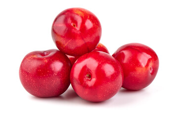 Red plums, fresh and ripe fruit isolated on white background.