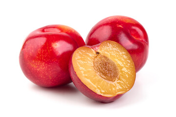 Red plums, fresh and ripe fruit isolated on white background.