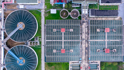 Aerial view circular clarifier tank at wastewater treatment plant, Industrial infrastructure,...