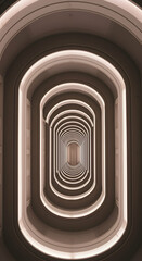 Fototapeta premium Endless architectural hallway modern design interior perspective looping arches light beige tones