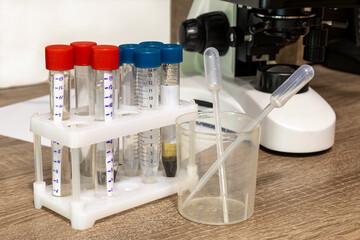 Close-up of test tubes and pipettes
