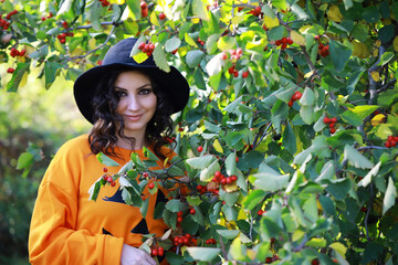 Happy family walk in the park on Halloween. Family dressed up in Halloween costumes