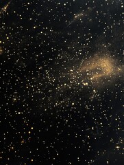 Golden glitter stars on black background, abstract night sky, celestial dust, overhead studio shot, close up