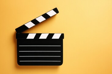 Film Clapperboard on Yellow Background for Movie Production Use