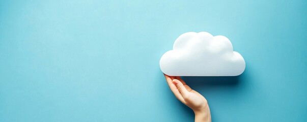 Hand Holding White Cloud on Blue Background Cloud Computing Concept, Cloud Storage, Data Security Cloud Computing, Digital Storage
