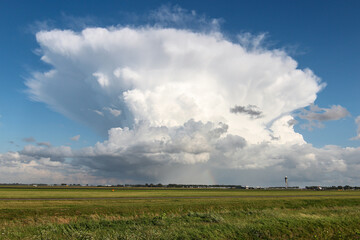 Fototapeta na wymiar Cumulonimbus capillatus above Amsterdam Airport Schiphol