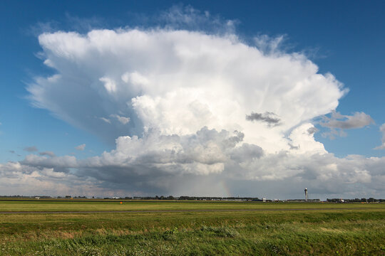 Fototapeta Cumulonimbus capillatus above Amsterdam Airport Schiphol