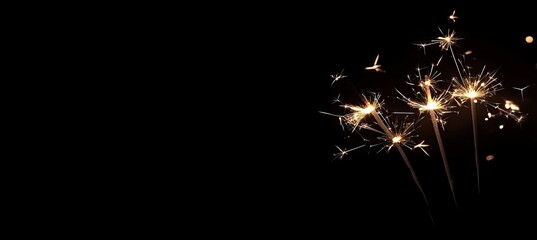 Sparkling sparklers against a black background