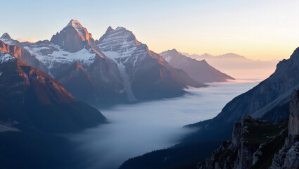 Majestic Mountain Range Covered in Misty Sunrise