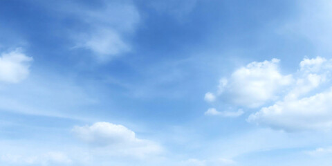 Obraz premium Expansive blue sky with voluminous clouds creates serene and tranquil atmosphere, inviting sense of peace and wonder. soft, fluffy clouds drift gently across bright sky