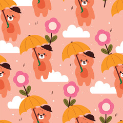 Obraz premium seamless pattern cute cartoon bear wearing hat and yellow umbrella with cartoon flower. cute animal pattern for wallpaper and background