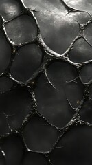 Abstract black and gray textured pattern featuring interconnected organic shapes in a modern artistic style