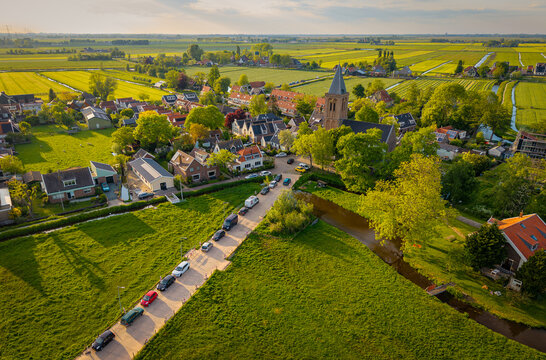 Aerial view of Zunderdorp on a sunny spring afternoon, idyllic dutch village in Province North Holland