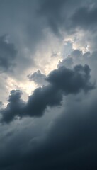 Obraz premium plane flying through a cloudy sky on a cloudy day