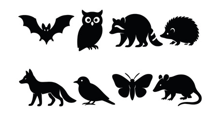 Naklejka premium Nocturnal animal silhouettes icons set – simple, shadow wildlife symbols