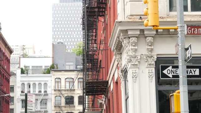 New York City Manhattan Soho fashion district Grand, Crosby streets, Broadway. USA urban building facade, old classic american architecture in NYC, United States. Business and residential real estate.