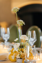 Event decor with white orchids and other white flowers in a restaurant. Restaurant design.