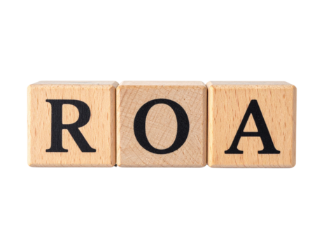Wooden blocks displaying the letters R, O, and A in black font.